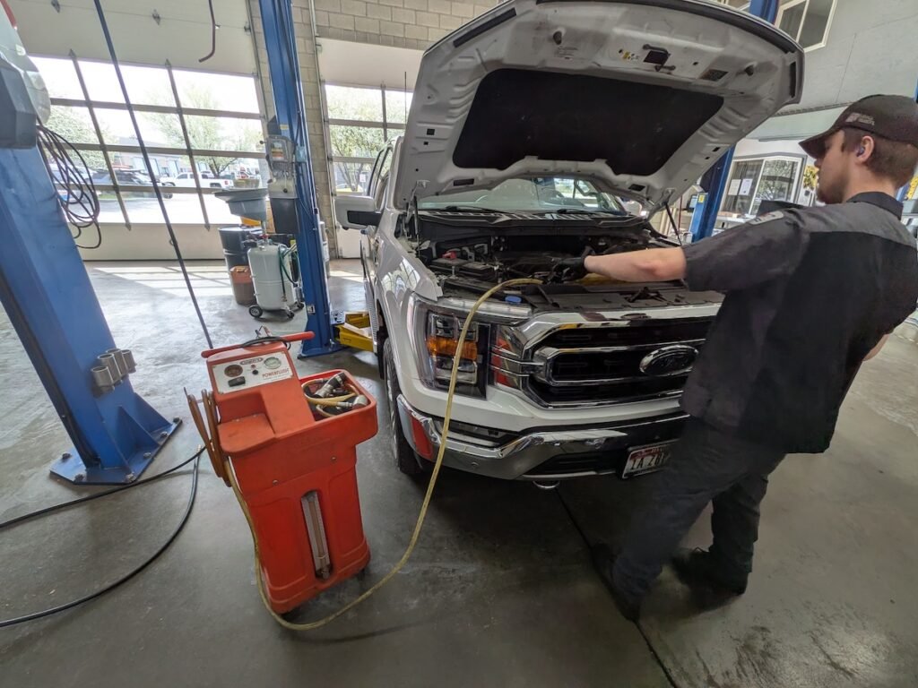 adding antifreeze or coolant to a car