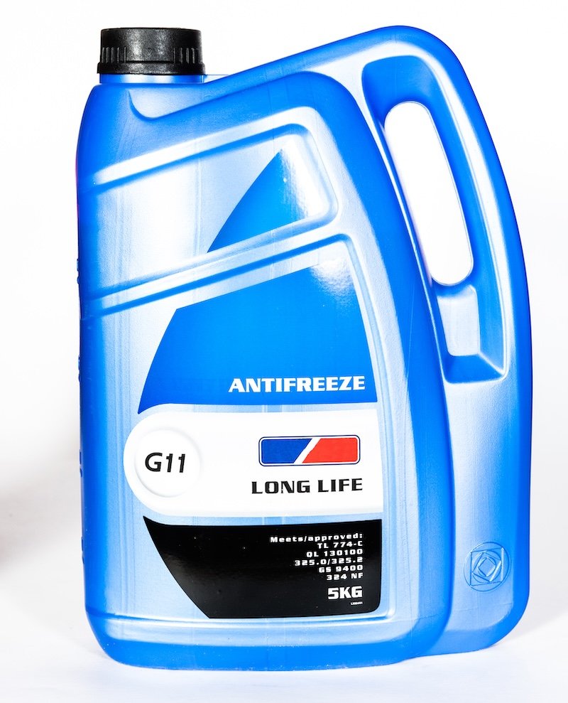 Fine and sharp picture of motor antifreeze bottle isolated on white