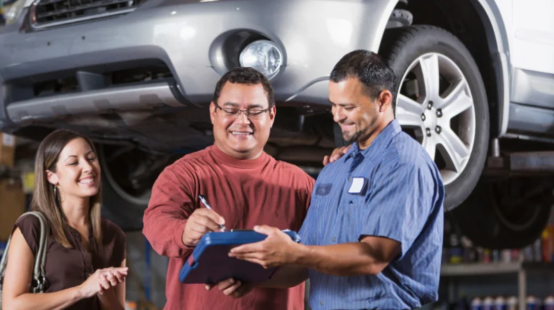 auto repair consultation in garage