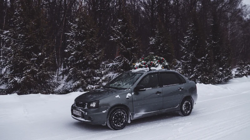 car on snow road