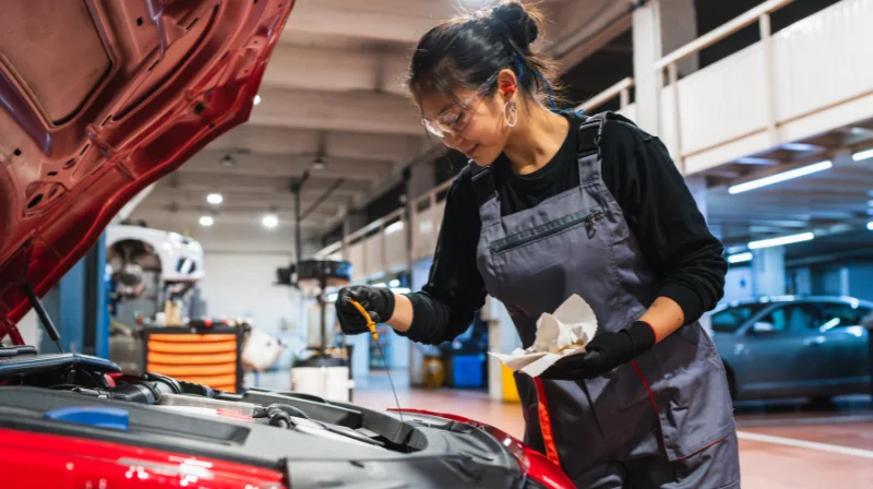 mechanic checking car
