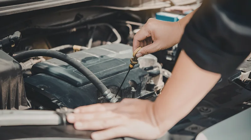 mechanic checking engine