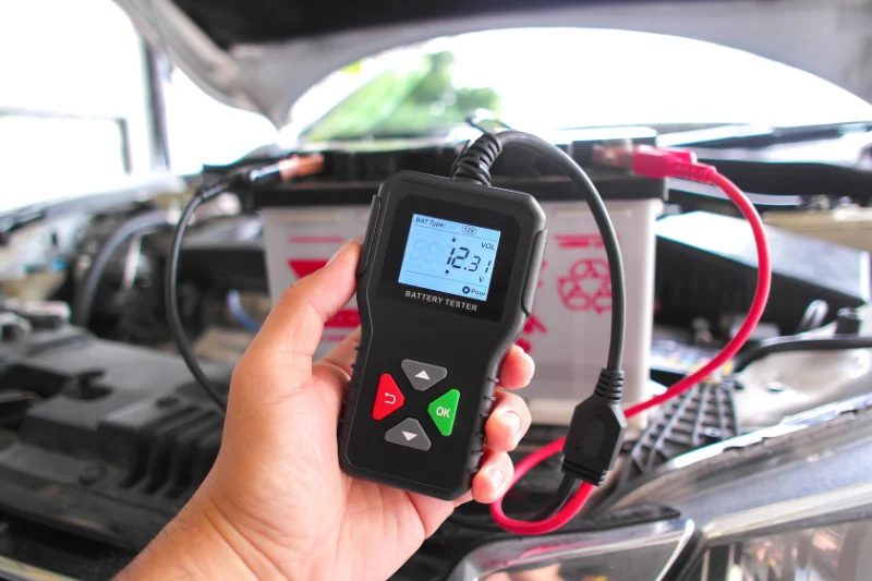 mechanic using diagnostic scanner