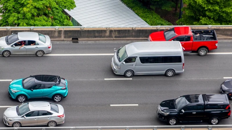 multiple vehicles driving on highway