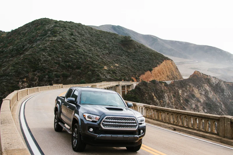 vehicle on winding mountain road